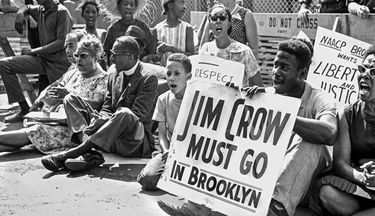Black people forming a sit-in. Fighting segregation in the Jim Crow North.